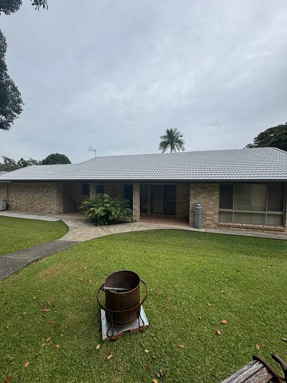 A finished home with a light grey roof