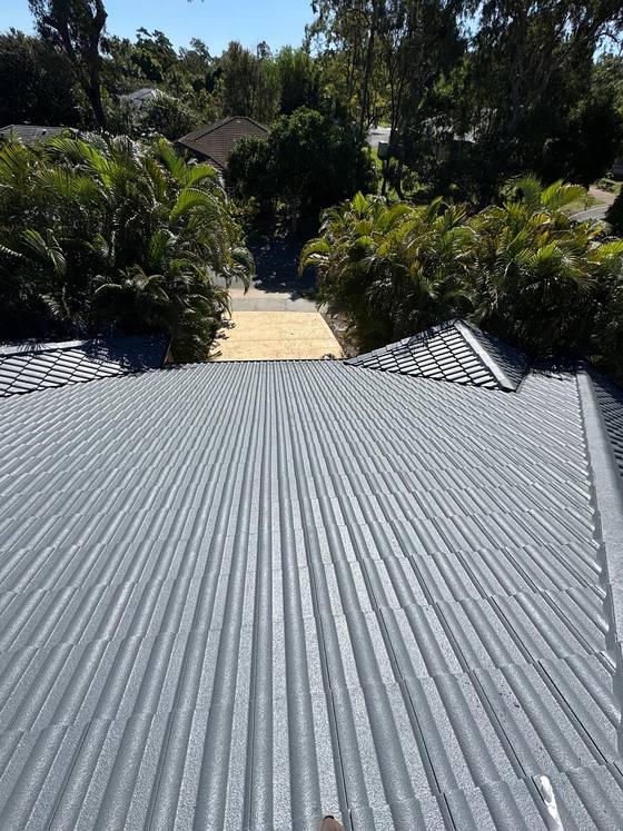 A long run of restored grey roof sheeting